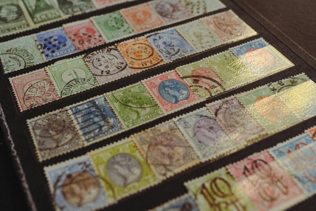 A collection of postage stamps laid out on a table