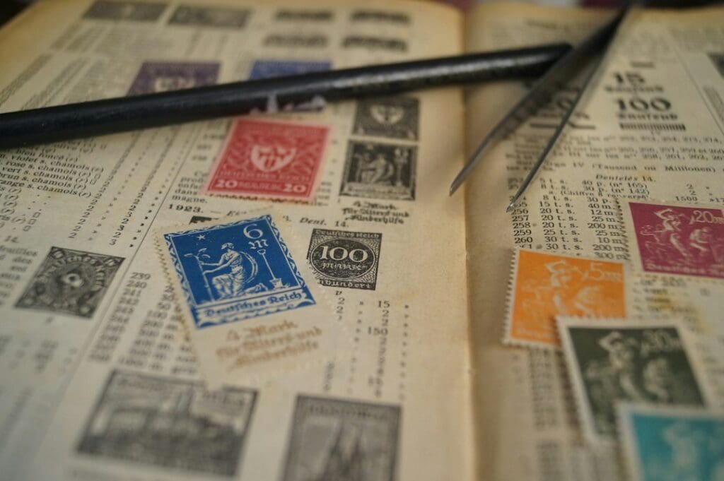 Vintage postage stamps in a catalogue